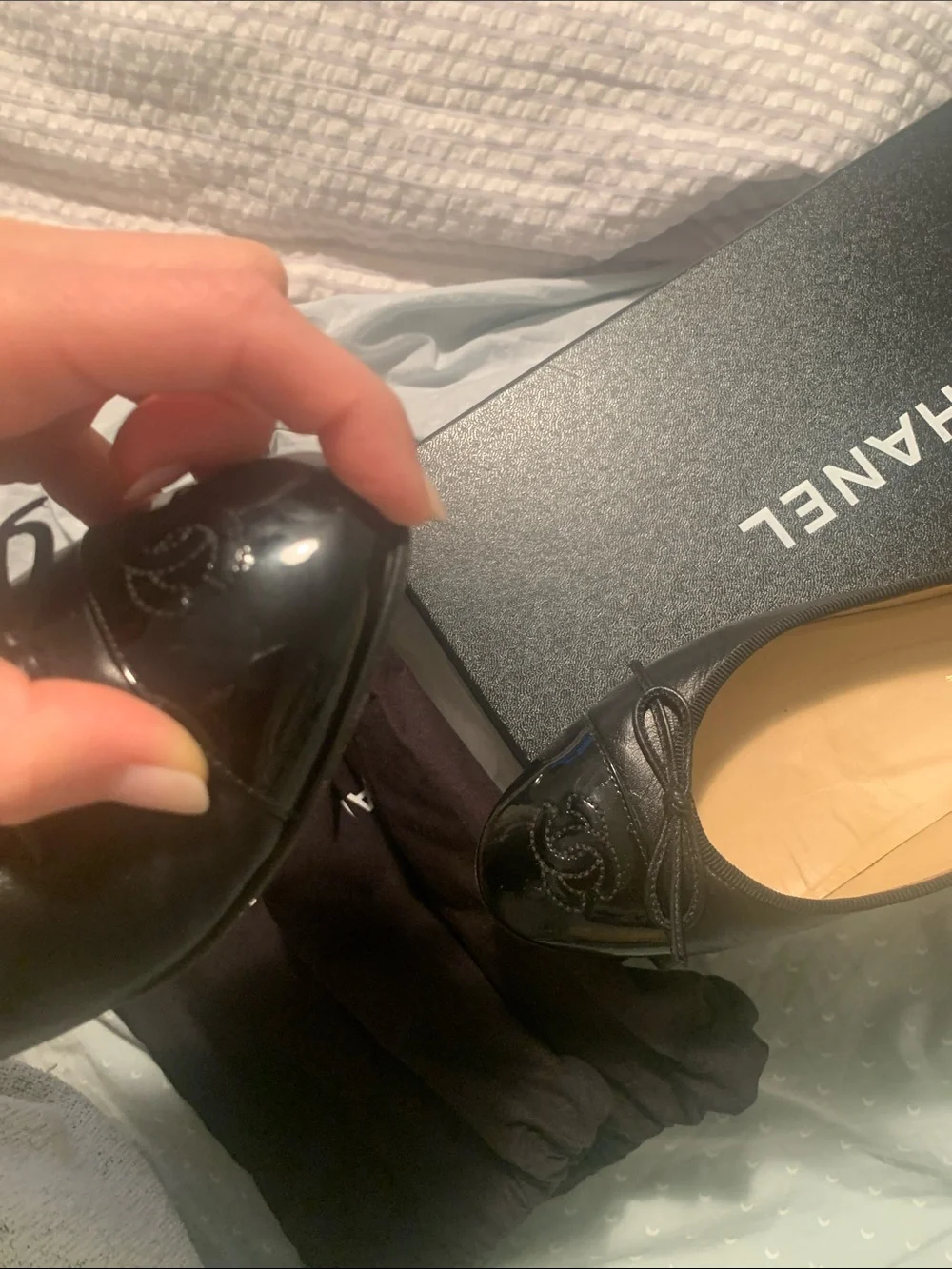CHANEL Black Leather Cap-Toe CC Ballet Flats